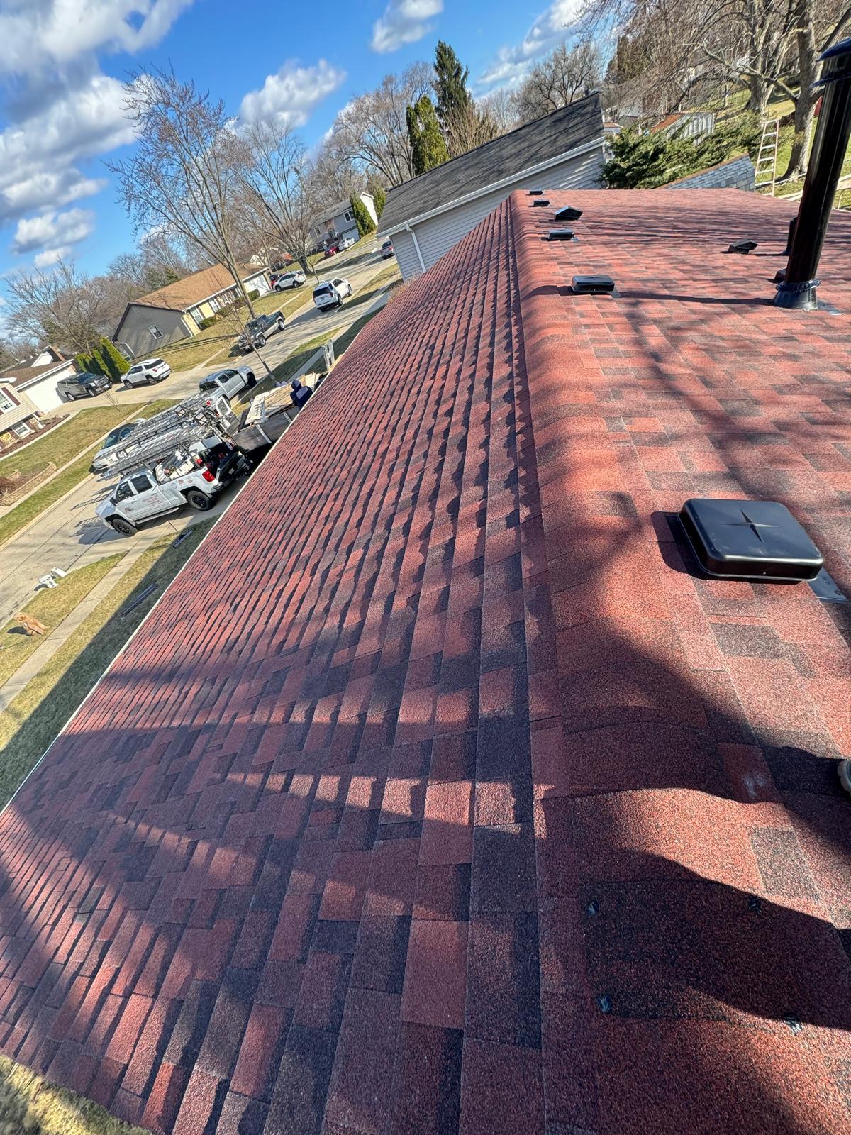 Completed roof full ridge view — roof replacement, storm damage roof repair, roof inspection, roof decking replacement, synthetic underlayment, completed roof installation, New Gen 180 LLC, Elgin IL, residential roofing