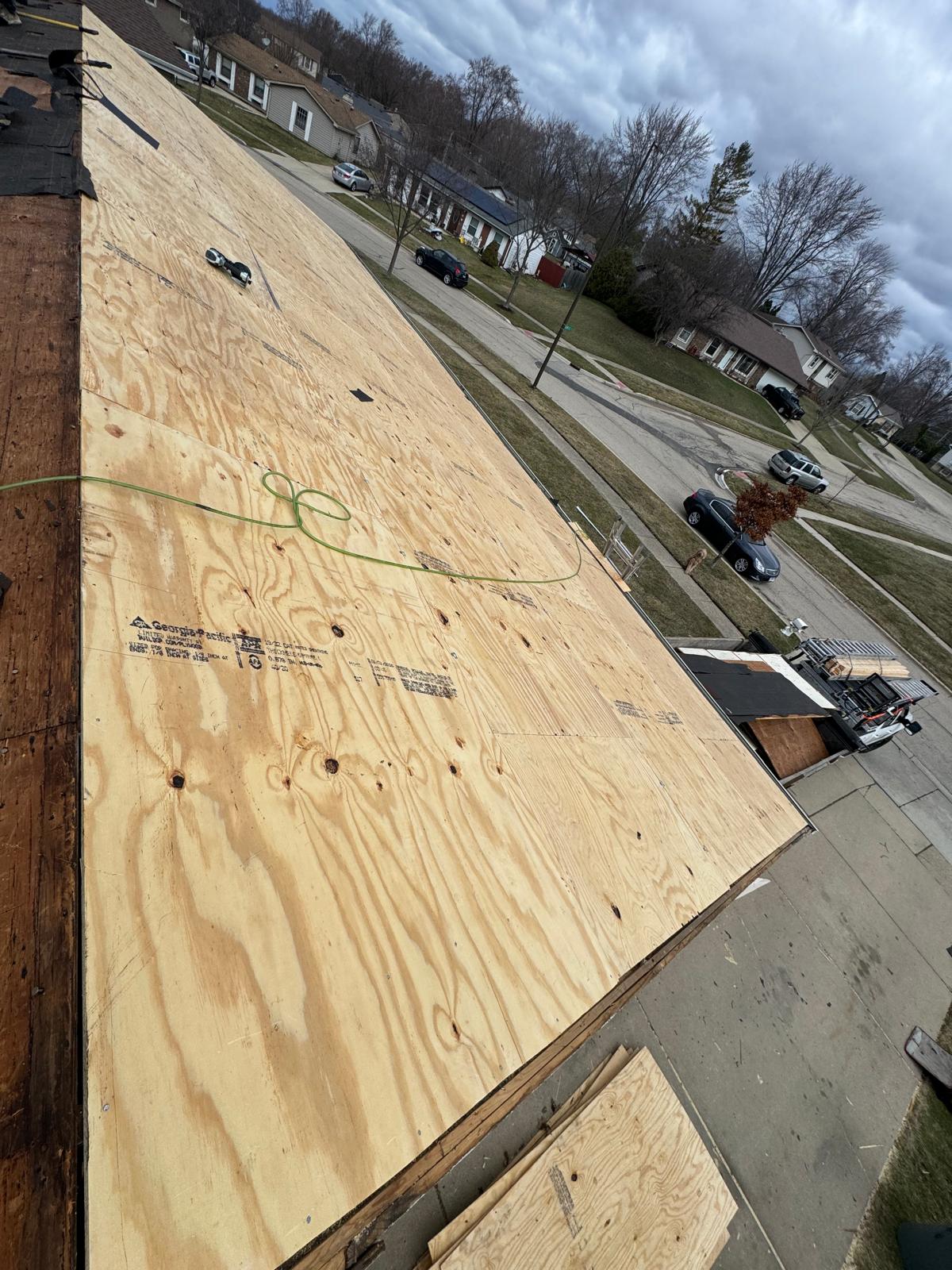 Roof decking replacement overcast day — roof replacement, storm damage roof repair, roof inspection, roof decking replacement, synthetic underlayment, completed roof installation, New Gen 180 LLC, Elgin IL, residential roofing