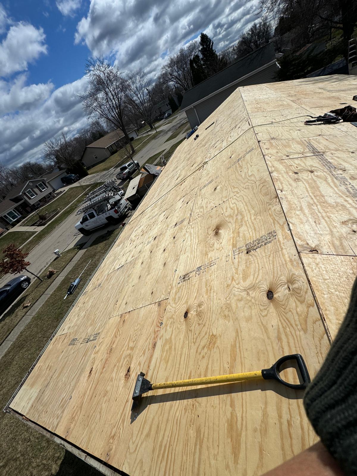 New roof decking on sunny day, full re-deck — roof replacement, storm damage roof repair, roof inspection, roof decking replacement, synthetic underlayment, completed roof installation, New Gen 180 LLC, Elgin IL, residential roofing