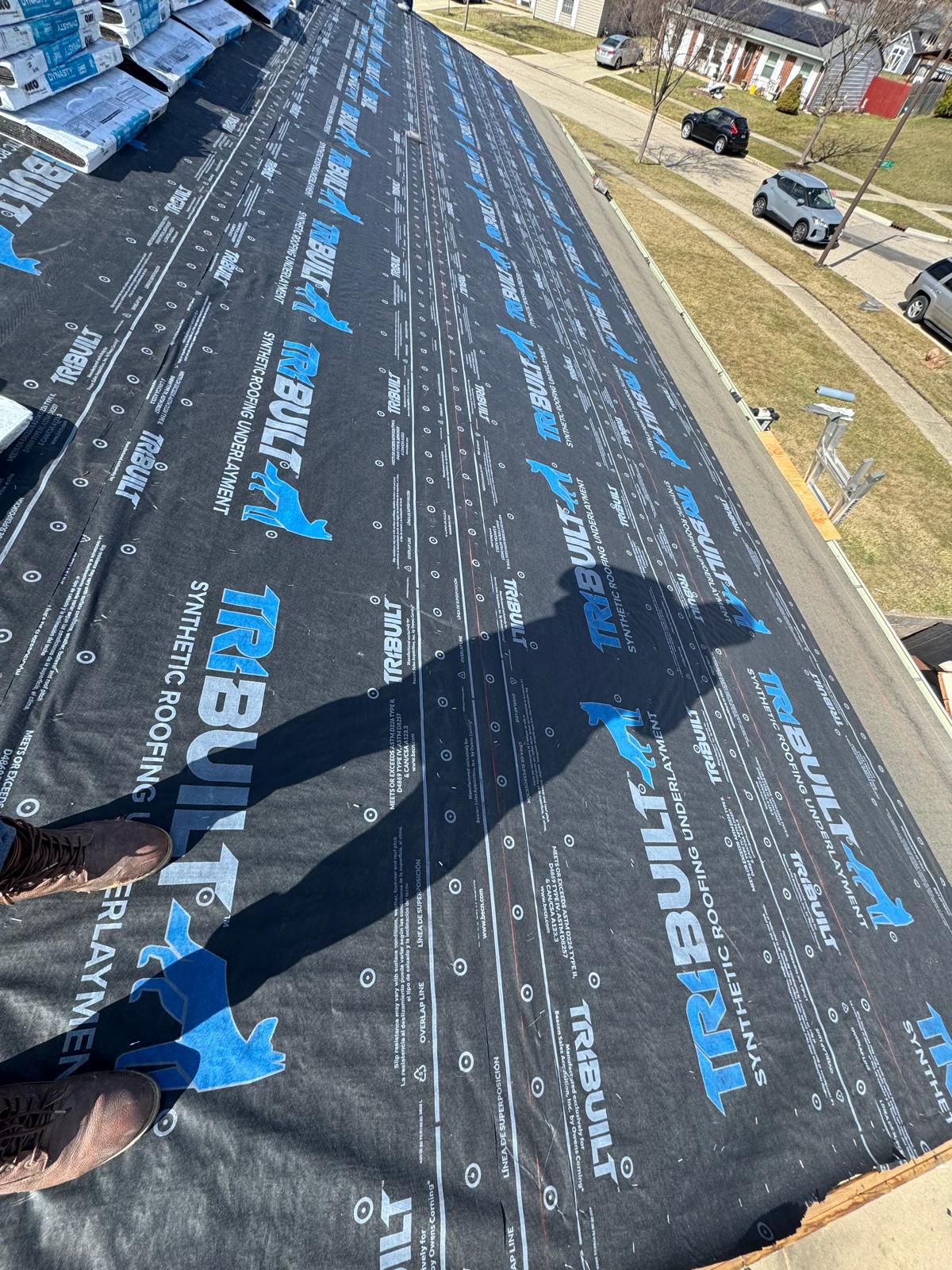 TRIBUILT synthetic roofing underlayment installed — roof replacement, storm damage roof repair, roof inspection, roof decking replacement, synthetic underlayment, completed roof installation, New Gen 180 LLC, Elgin IL, residential roofing